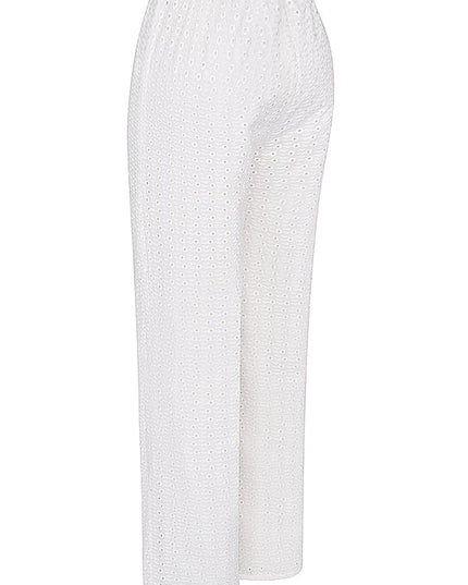 Witte bralettetop met borduursel en losse broek