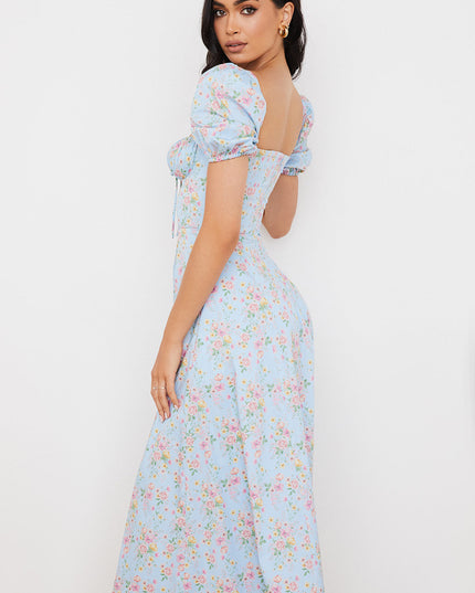 Middelgrote zomerjurk met bloemen pofmouwen