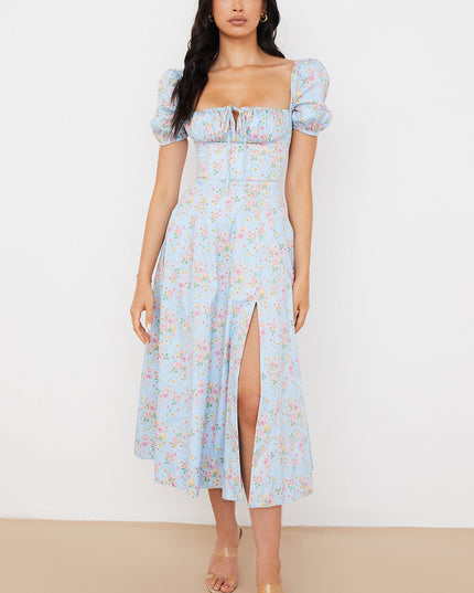 Middelgrote zomerjurk met bloemen pofmouwen
