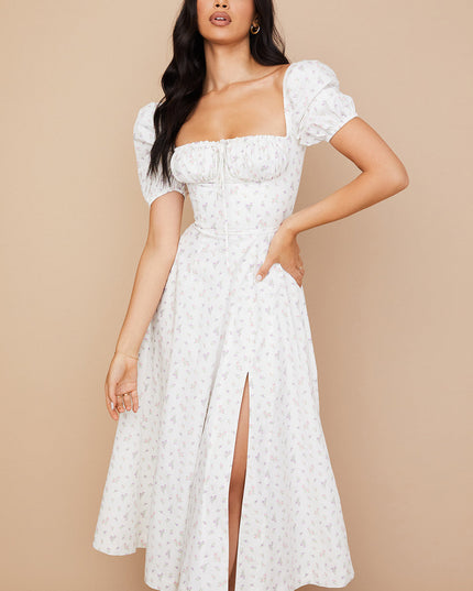 Middelgrote zomerjurk met bloemen pofmouwen
