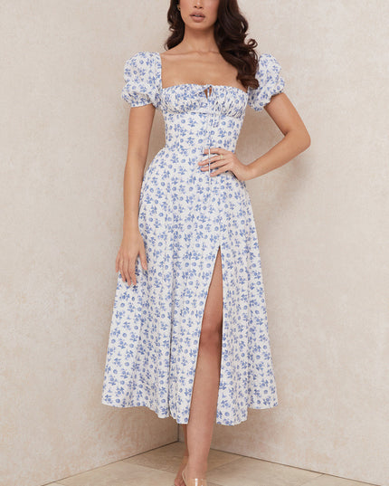 Middelgrote zomerjurk met bloemen pofmouwen