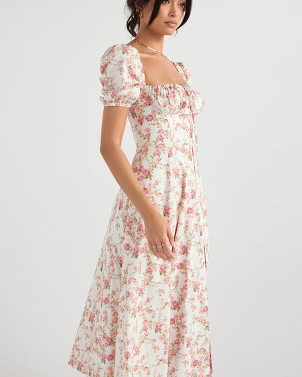 Middelgrote zomerjurk met bloemen pofmouwen