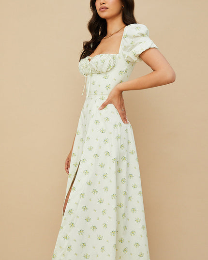 Middelgrote zomerjurk met bloemen pofmouwen