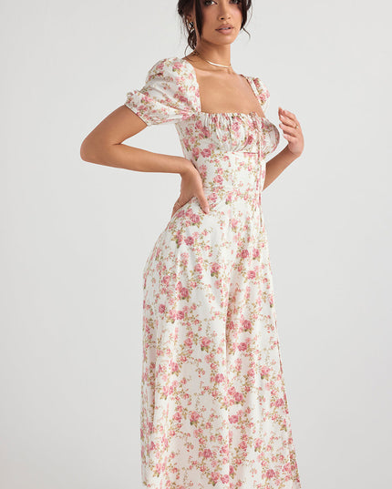 Middelgrote zomerjurk met bloemen pofmouwen