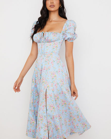 Middelgrote zomerjurk met bloemen pofmouwen