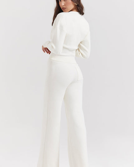 Wit gebreid vest met V-hals en broek