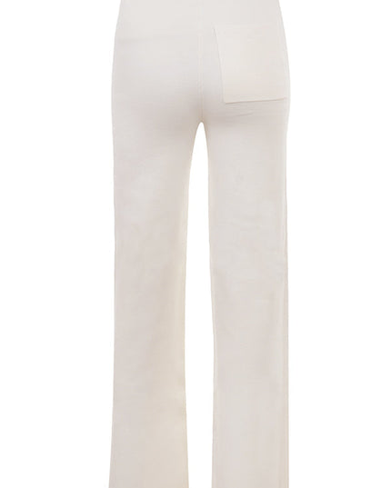 Wit gebreid vest met V-hals en broek